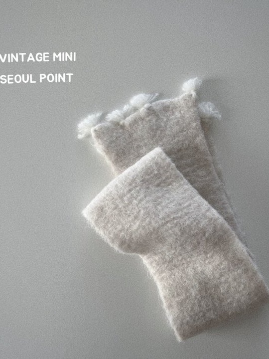 Knit Tessel Muffler