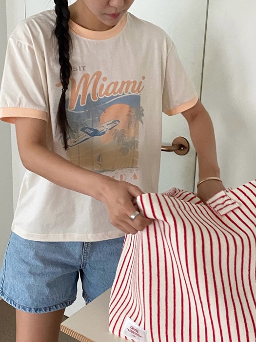Visit Tee