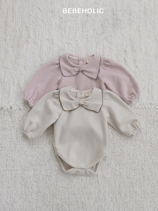 Pauline Pintuck Suit