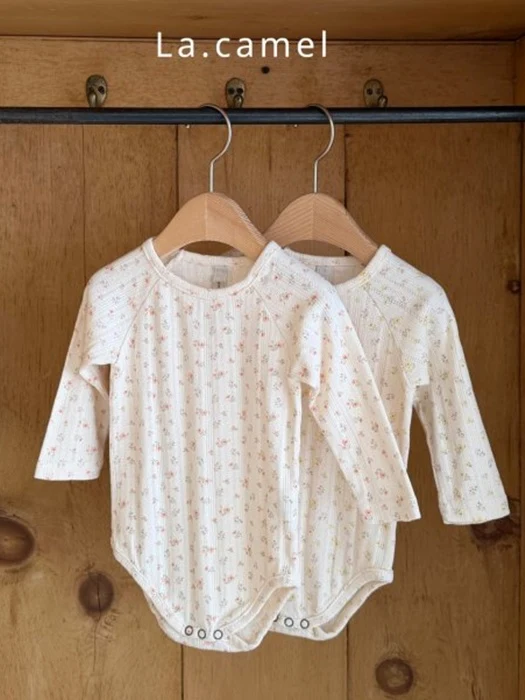 Swan Eyelet Suit